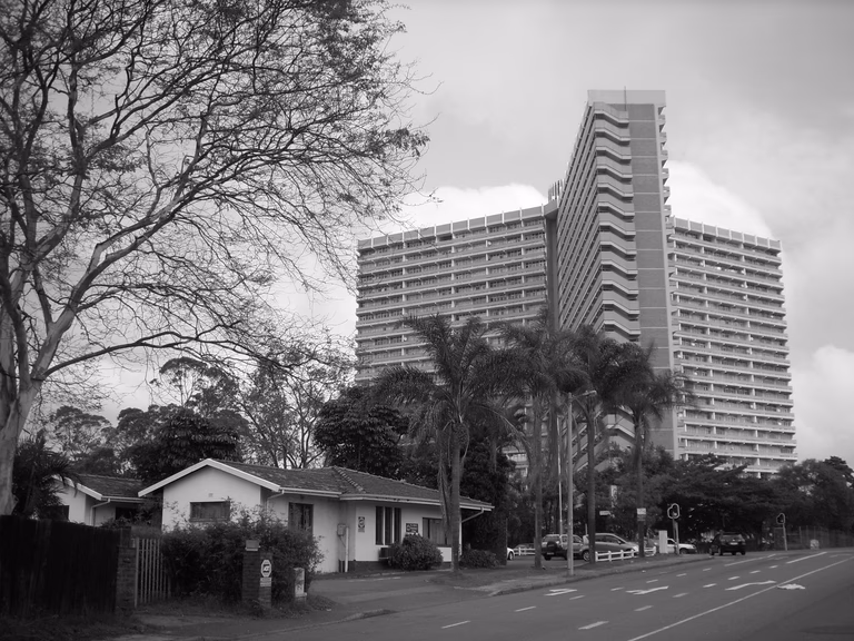 Live in a safe apartment building close to amenities